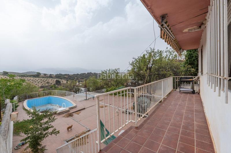 Foto dd7d0e45-a99f-4db6-a6b8-585fa39cbf31. Chalet en camino de la barrera (far) 58 el Fargue 2000 metros de parcela segregable con chalet de 178m en tres plantas mas nave de 90 metros en Granada