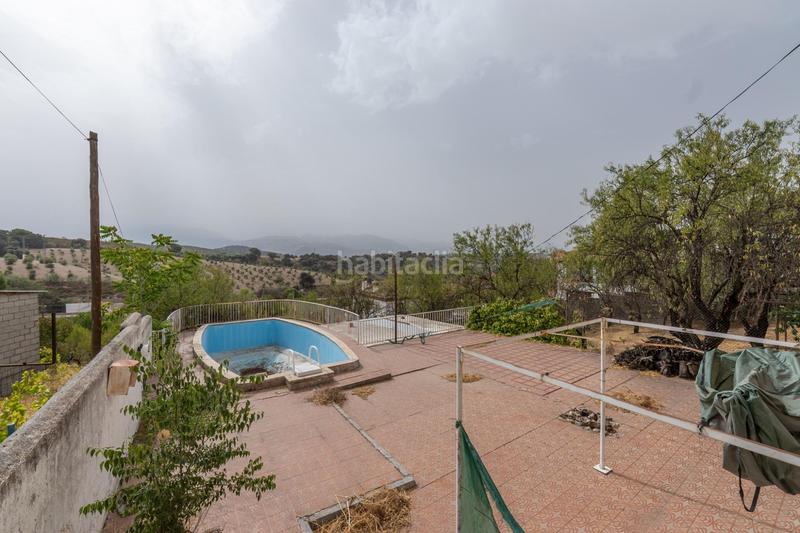 Foto e19c2394-5c45-48f8-8cd4-6031bf310261. Chalet en camino de la barrera (far) 58 el Fargue 2000 metros de parcela segregable con chalet de 178m en tres plantas mas nave de 90 metros en Granada