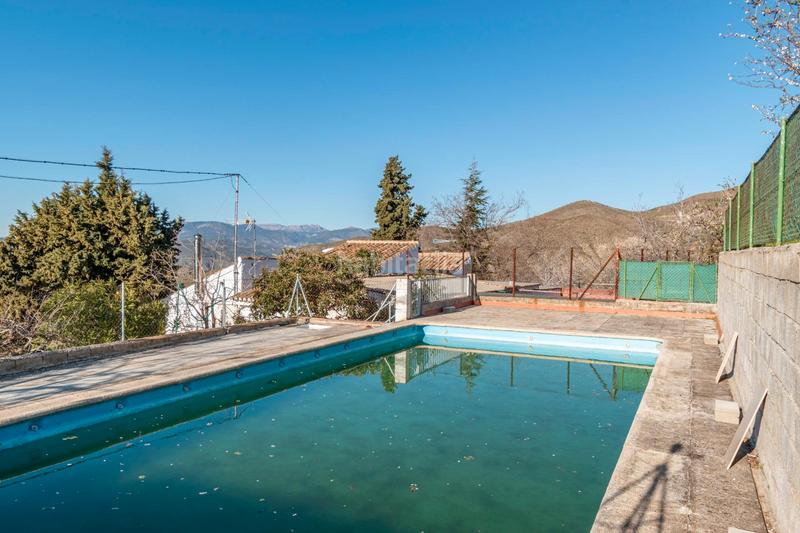 Foto 9ddfadec-c62f-4581-bdf8-c3082854efea. Masía cortijo con piscina en Monachil pueblo Monachil