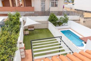 Maison à Ogíjares. Adosada con patio grande