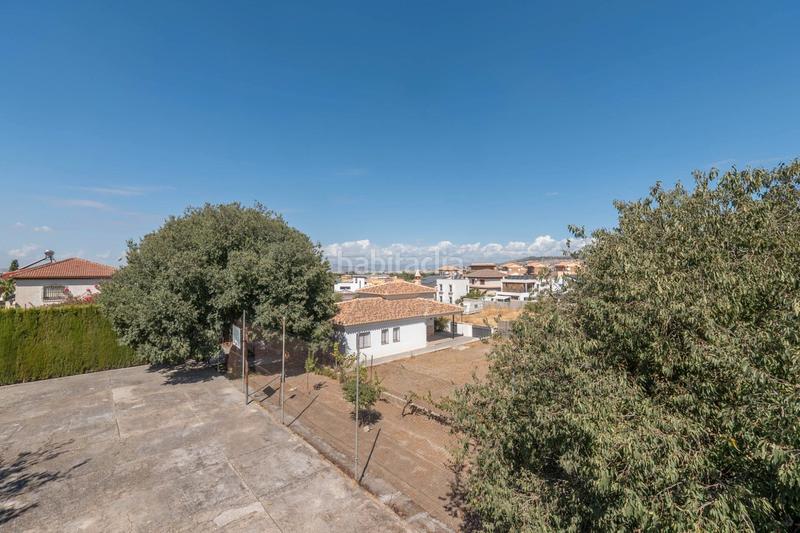 Foto 3d140f24-e94d-422a-8397-e544eac37793. Casa aparellada amb aparcament a Cájar