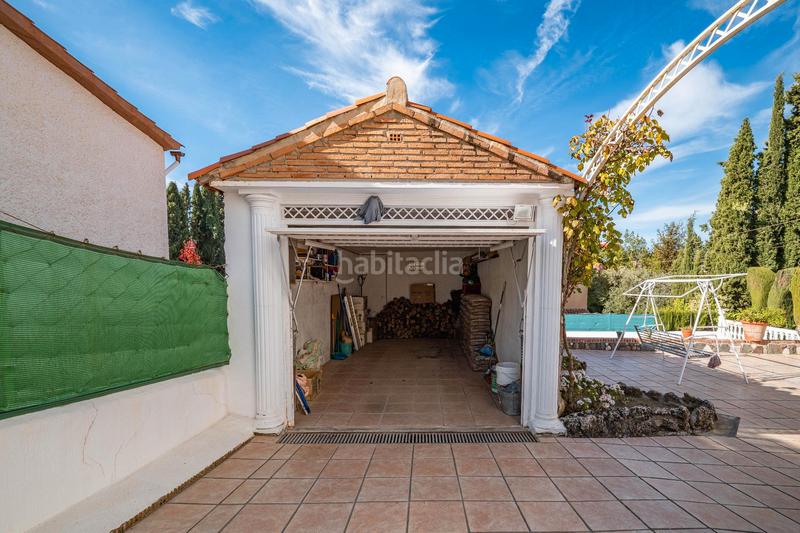 Foto 3c321381-68ee-47ba-8a47-ef98e9bf07dd. Chalet in calle aynadamar 5 in Alfacar