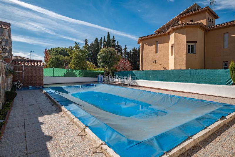 Foto 61552198-adf7-4ded-b130-628b3adeb420. Chalet in calle aynadamar 5 in Alfacar