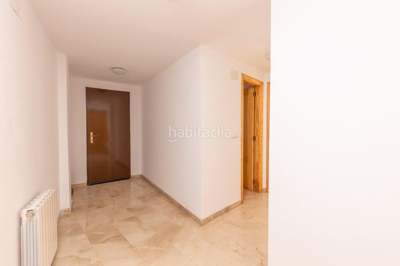 Foto c6a0ea9e-7225-425a-801c-6e27fb04f6c3. Casa adosada en calle madrid 71 casa con garaje y trastero en Monachil