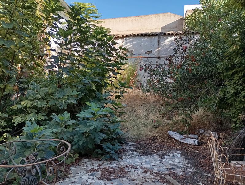 Foto 9724fb25-c21d-4d27-a8c3-c16e9232cf54. Casa con camino riscaldamento parcheggio in Atarfe