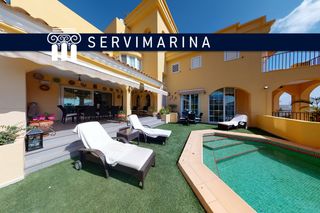 Chalet in Calle altos del golf 19. Gran chalet en la urb. marina de la torre, con vistas al mar y a