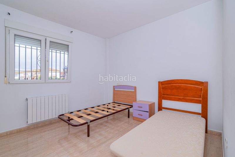 Foto 7b02df88-03d3-48f7-bb59-865f072d0d9b. Xalet amb xemeneia calefacció aparcament piscina a Atarfe