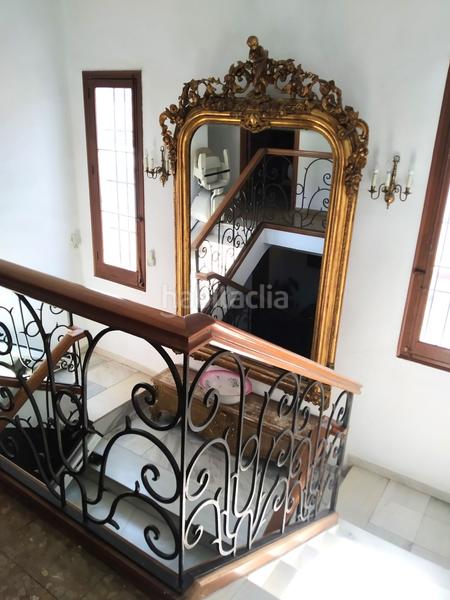Foto df9ba53a-3448-47c5-be4e-eb3c7444f559. Casa con parcheggio in Barrio de Ciudad Jardín Málaga
