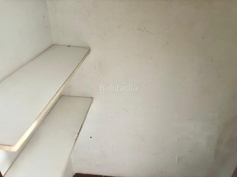 Foto 5de8d105-370d-4806-8196-6056a4efeeb1. Casa adossada amb aparcament a San Julián Sevilla
