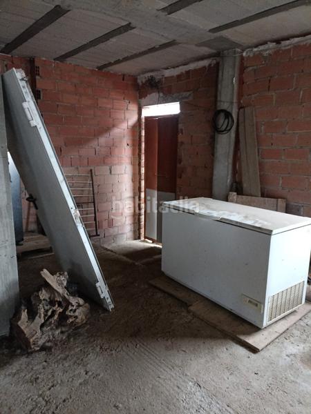 Foto c9faa75b-dbb2-4b5f-b2b1-66ae66e234ca. Edifici a Almodóvar del Río