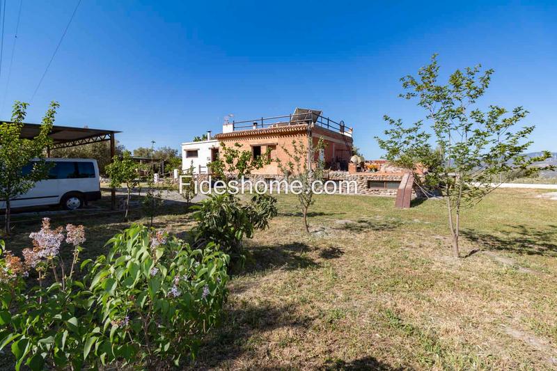 Foto c54954d3-c266-46e6-a4cb-1ff60a11bb7b. Bauernhof mit kamin heizung parking in Nigüelas