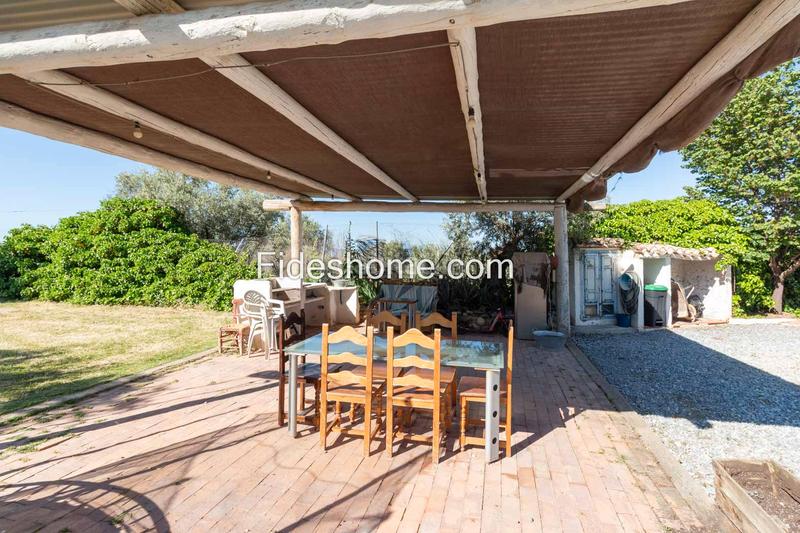 Foto d5945612-3446-425f-aee2-e2652a821697. Bauernhof mit kamin heizung parking in Nigüelas