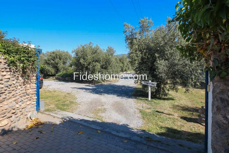 Foto db9952c1-b7e0-4b1f-b879-9d618a3ca660. Bauernhof mit kamin heizung parking in Nigüelas