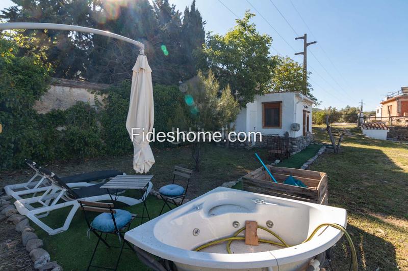 Foto eaaaaf94-2b99-43e8-b4c9-1f9ddb914c86. Bauernhof mit kamin heizung parking in Nigüelas