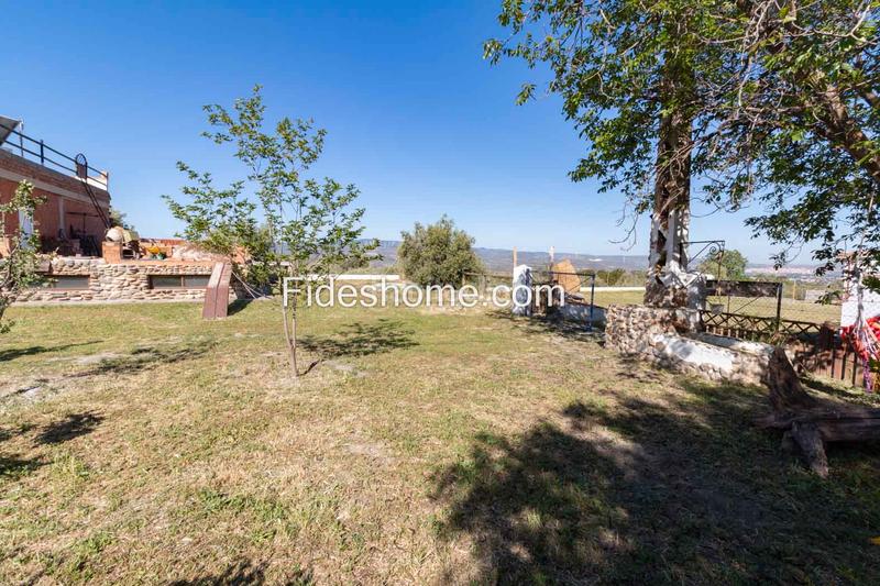 Foto ed3da0d4-a98f-4f69-bb8b-74d29ecf0de5. Bauernhof mit kamin heizung parking in Nigüelas