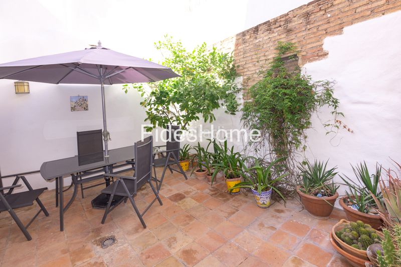 Foto b6f9459d-6166-430e-bd51-cedf6a8de0db. Casa adossada a calle carniceria 21 a Lecrín