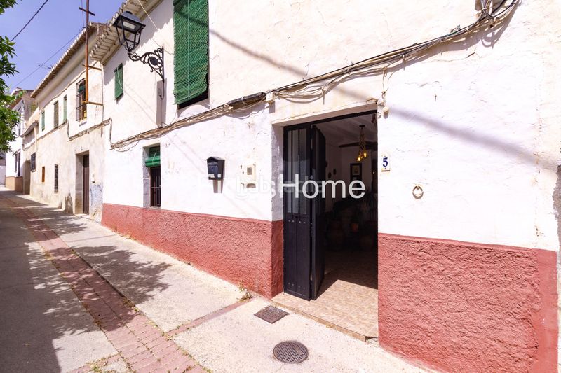 Foto 42891fe6-34e4-42dd-8fbd-fcd1edb5ae0c. Casa adossada a calle santisima trinidad 5 a Pinar (El)