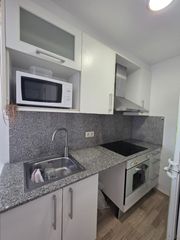Etagenwohnung in Banyoles. Pis d'una habitació amb traster i rentador independents