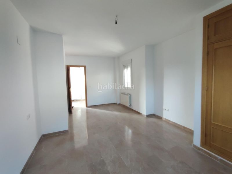 Foto 486344a6-f95d-4803-a0d3-fc51e6edc4fc. Casa adossada amb calefacció aparcament a Atarfe
