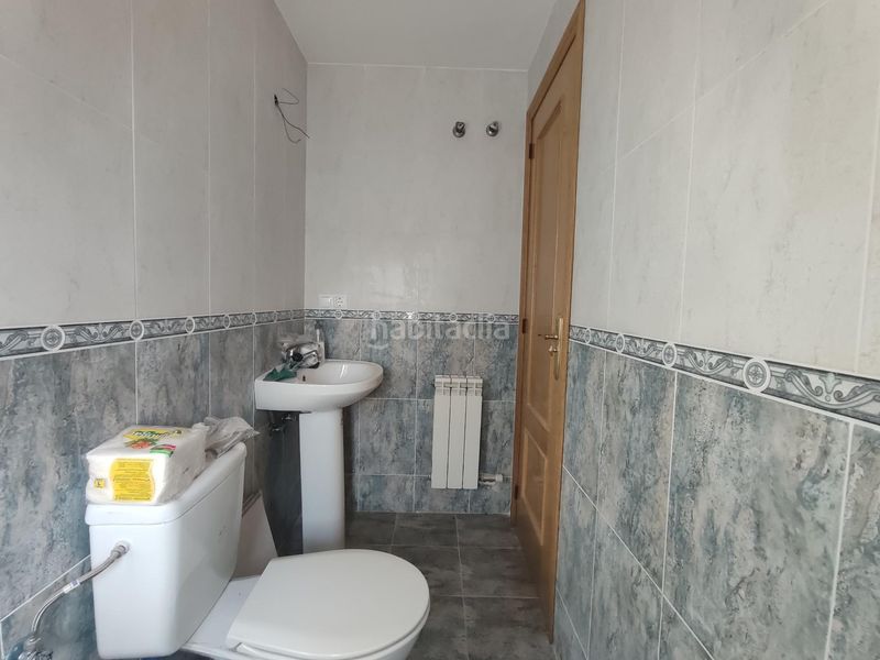 Foto 7fa2e134-1f0e-4d09-852d-163bd09fa01a. Casa adossada amb calefacció aparcament a Atarfe