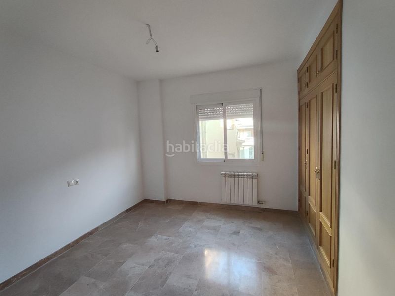 Foto c4ce6680-676b-4385-ad43-67ba54eb28d2. Casa adossada amb calefacció aparcament a Atarfe