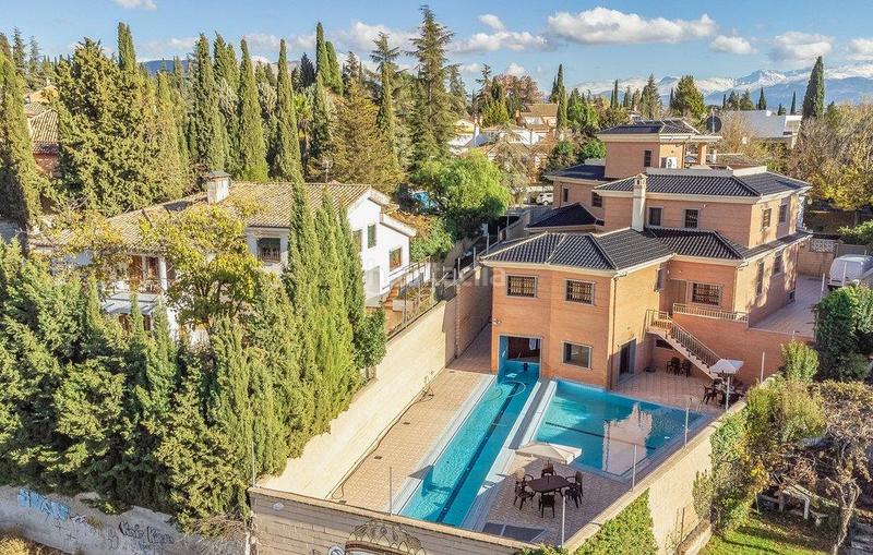 Foto 3d8c0640-8d7e-4bda-8017-77eb04d1118c. Chalet vive el lujo y la seguridad en cortijo del aire, granada! en Albolote