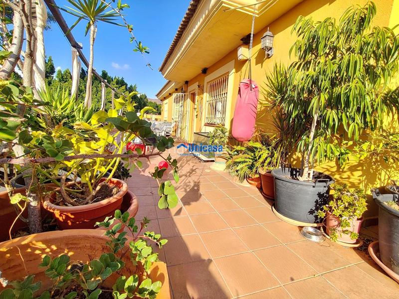 Foto 5e0f8ff7-c929-47ad-8504-9ebaf32a1b74. Casa amb calefacció a Fuente Alegre - El Chaparral - Los Morales Málaga