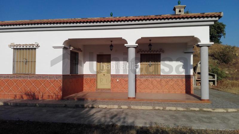 Foto 280dc197-36bb-47f4-bec9-113a6fdac319. Chalet avec parking dans Almogía