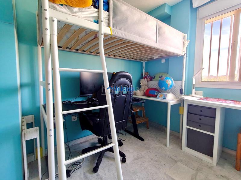 Foto 06ba0c15-76ce-426f-a13d-66370a878f72. Casa adossada amb calefacció aparcament piscina a Málaga