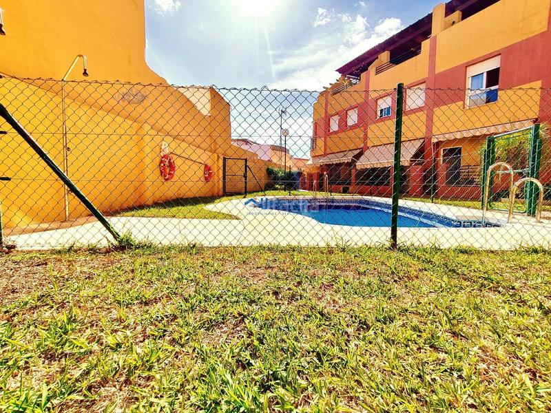 Foto a874094e-bfb8-4fb9-a0a7-3870c762fc56. Casa adossada amb calefacció aparcament piscina a Málaga