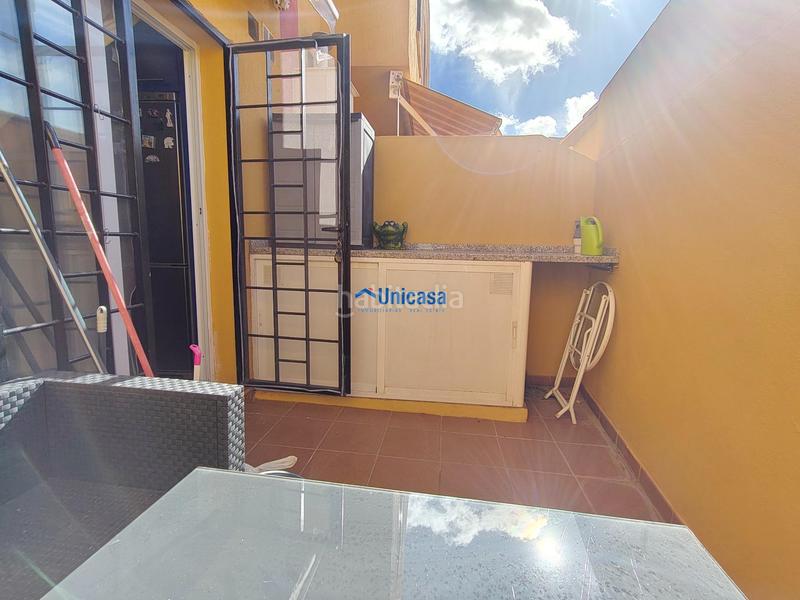 Foto bffcd736-3d53-453f-8fcc-1232bcdd6059. Casa adossada amb calefacció aparcament piscina a Málaga