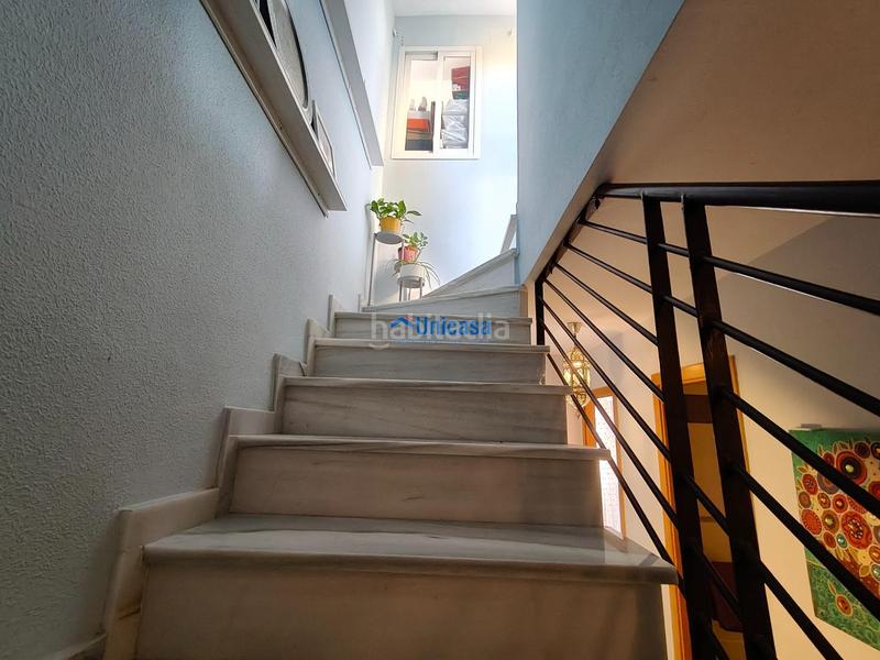 Foto ed2dca2d-971d-4627-8e84-2a393773f19f. Casa adossada amb calefacció aparcament piscina a Málaga