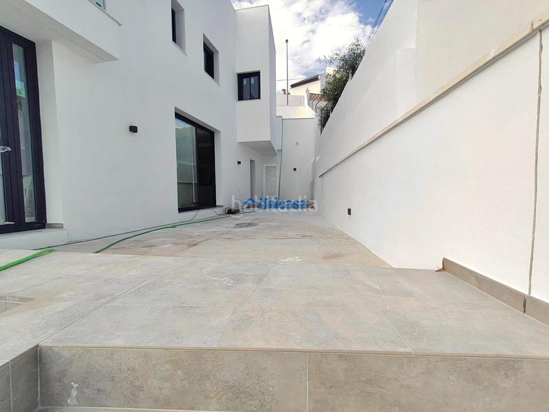 Foto 5585428d-b2f0-4443-8ca6-8b4142f7c252. Casa aparellada amb calefacció aparcament piscina a Málaga