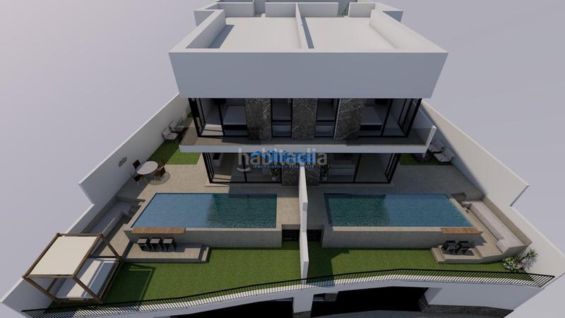 Foto 665ef18b-b78e-4392-a6e2-648194df29e0. Casa aparellada amb calefacció aparcament piscina a Málaga