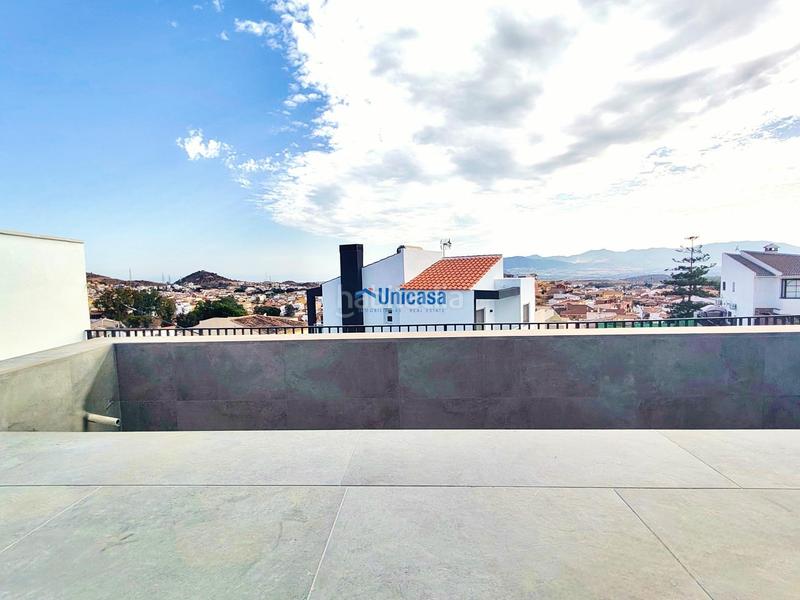 Foto 9f5220bd-d51b-4407-a117-5484c3e138c5. Casa aparellada amb calefacció aparcament piscina a Málaga