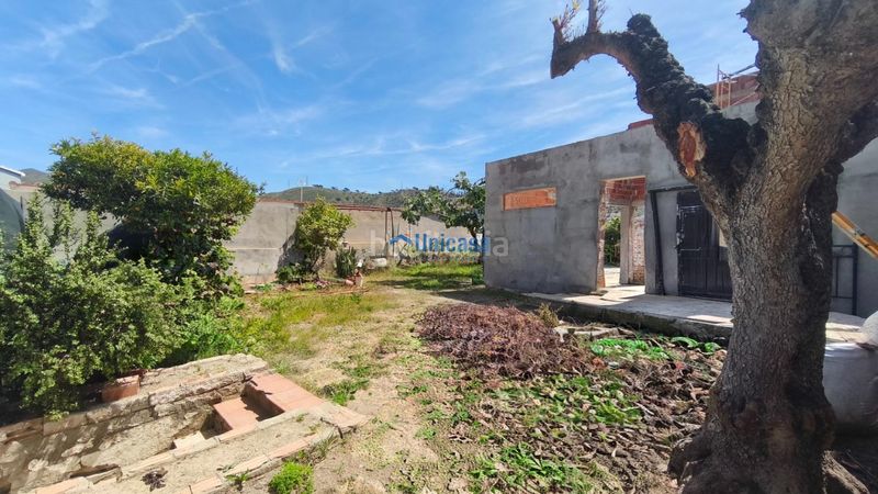 Foto 1ab02dee-8552-4e93-94be-4e4f277e4754. Casa aparellada amb aparcament a Fuente Alegre - El Chaparral - Los Morales Málaga