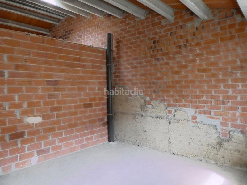Foto 50f992ff-069d-424d-ab53-75fe0fc464e1. Casa adosada en Torelló