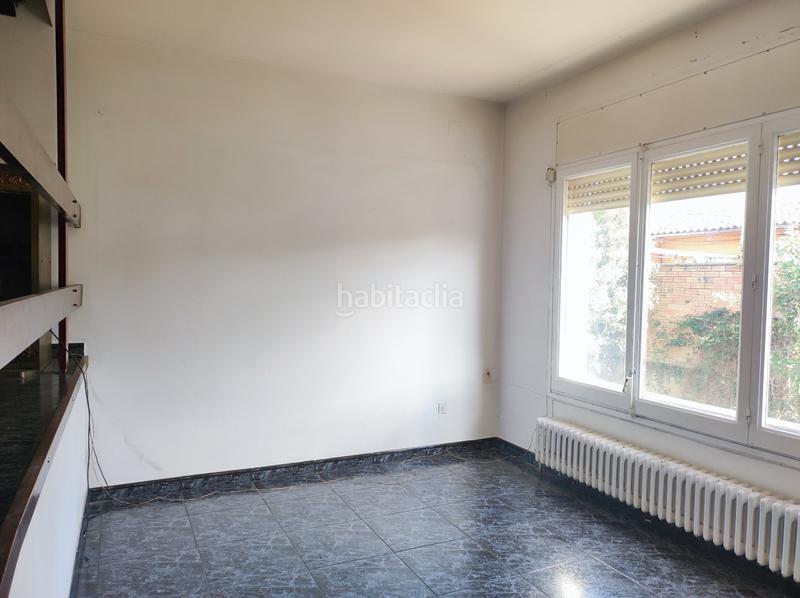 Foto 23d520d1-b7a8-4751-9884-e83413fa8931. Casa adosada en Torelló