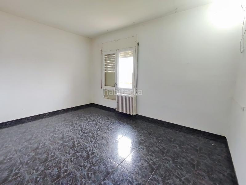 Foto cee82117-2c87-418d-a7e6-098dbf870a18. Casa adosada en Torelló