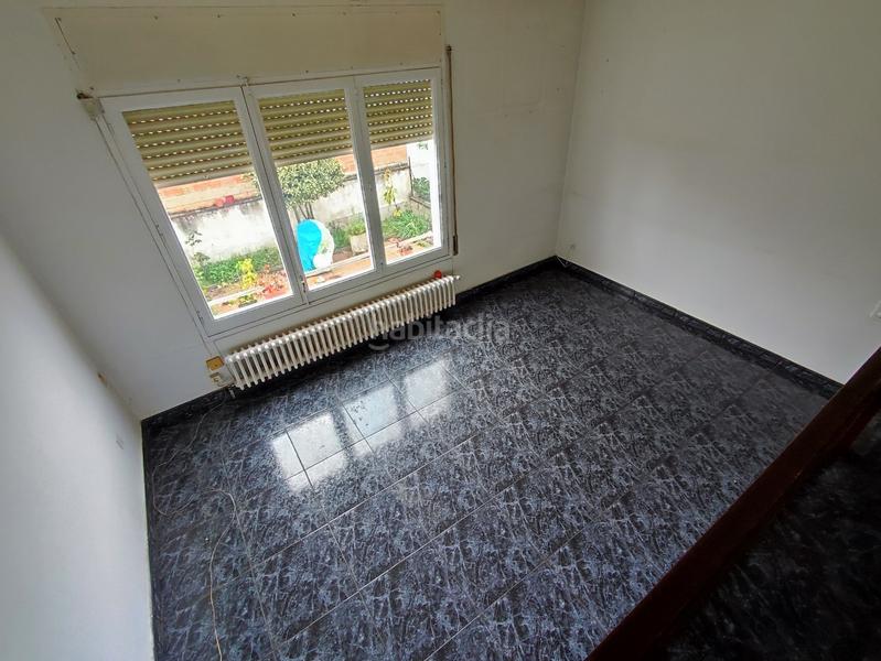 Foto dd7f6aa1-774f-46cc-b8f7-0294e8b814fb. Casa adossada amb calefacció aparcament a Torelló