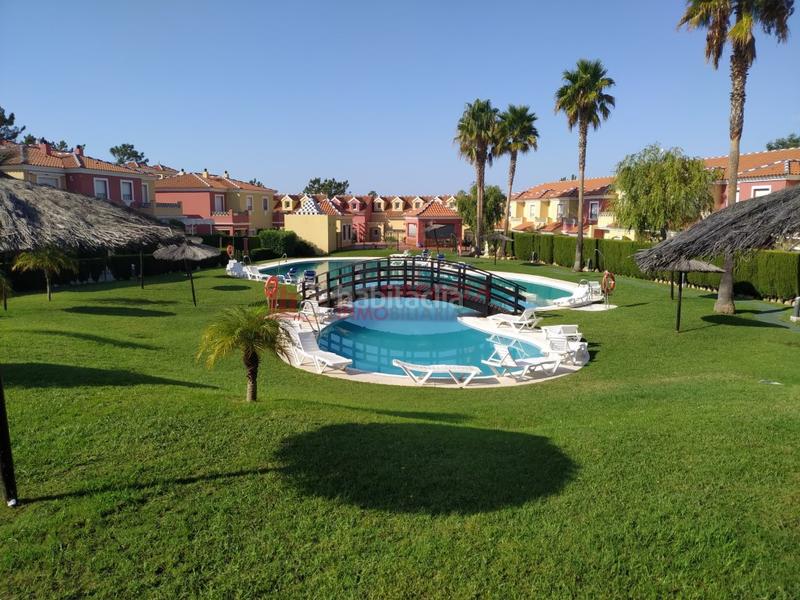 Foto 18ce23ca-f82c-4d86-a1d8-d1b8a9608745. Location maison jumelée dans Islantilla golf Islantilla