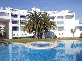 Duplex  Campanilles. Apartamento dúplex cerca de la playa romana con jardín y piscina