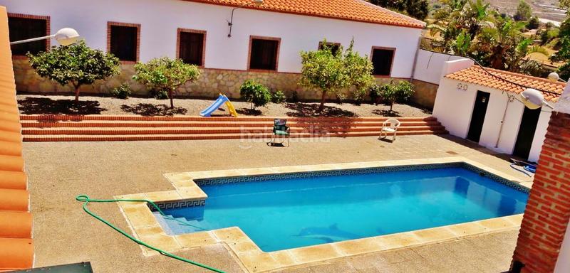 Foto 1bb9f2f5-1659-41df-b759-860f3cc8af6c. Lloguer apartament amb xemeneia aparcament piscina a Motril