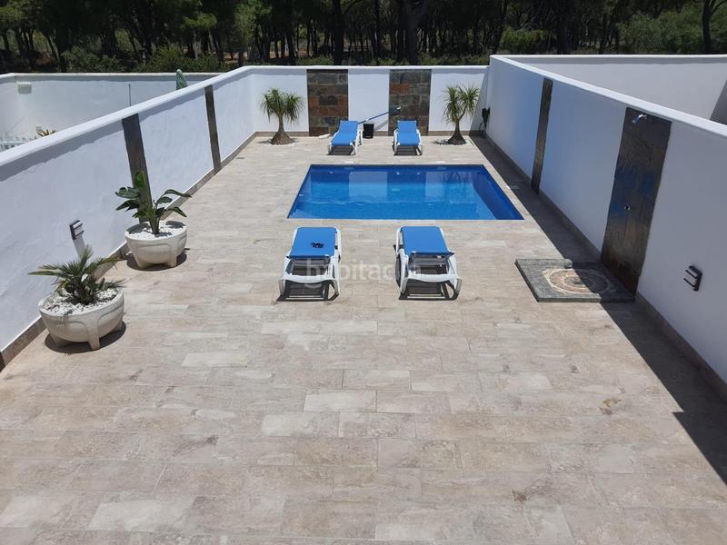 Foto 46eefaf9-b6e3-4b96-93ae-fa73edcec507. Casa adossada amb piscina a La Barrosa Chiclana de la Frontera