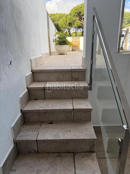 Foto adae0c8b-da5b-43a3-ac7c-0ab507dc3044. Casa adossada amb piscina a La Barrosa Chiclana de la Frontera