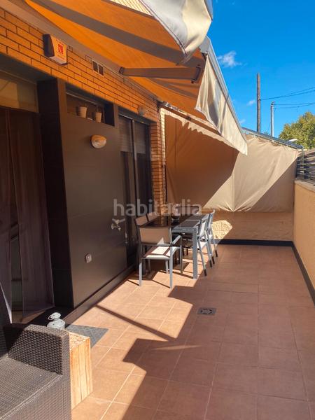Foto f90f820c-fa81-4676-bd42-f3d94de72371. Casa adossada a avinguda 303 59 a Montmar Castelldefels