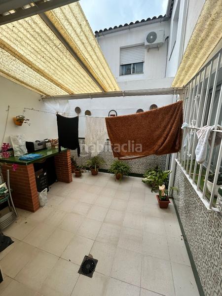Foto 10a05b90-4d27-4eab-ab97-80ea808d8f34. Casa adosada en avenida atabal 11 casa en venta en Málaga