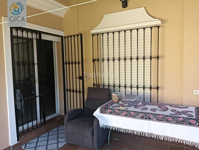 Foto d12d0e7c-0a6b-4da2-b8ba-9414d609d283. Casa pareada  con jardín, chimenea y parking en la menacha. en Algeciras