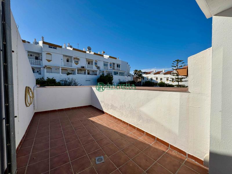 Foto a3b0efbc-544c-4448-ade6-254f76bd2c35. Chalet  adosado en venta en calle firmamento en Benalmádena