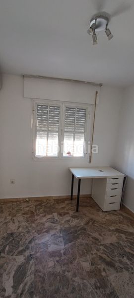Foto e5320fbf-2d79-4645-bfc8-b357c2c97a69. Rent towny house with fireplace parking pool in Capellanía - Retamar Alhaurín de la Torre